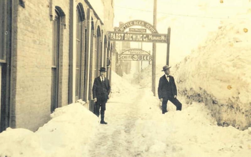 Looking west along the south side of 13th Street in the winter of 1902. The building at the immediate left now houses Handlebars Restaurant. Signs indicate Walters Beer Depot and the Scherer Bottling Plant. Photo courtesy of the San Juan Historical Society