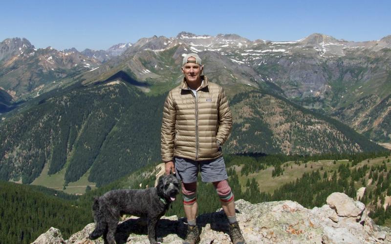 Jeff Burch on top of Ohio Peak just north of Silverton with his dog Photo by Jeff Burch