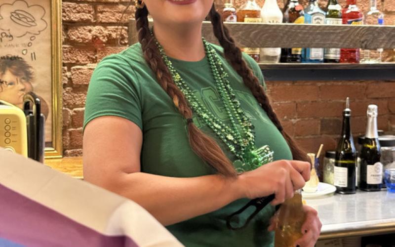 Natalie Streeter, The Den bartender is all smiles for St Patrick's Day photo by DeAnne Gallegos