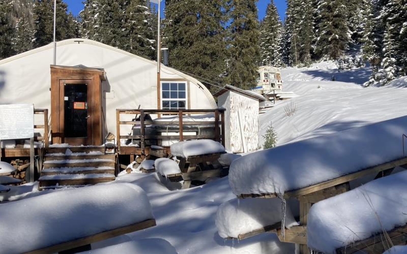 The ski area Silverton Mountain’s yurt and picnic tables are starting to pile up with fresh snow Photo by Hillary Cable