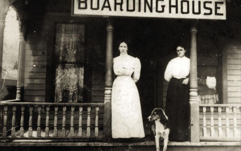 Mrs. O.M. Huff and boarding house helper Miss Telir on the porch of the boarding house in Eureka that Mrs. Huff operated under lease from “Preacher” Condit. the photo was believed taken between 1902 and 1908. Photo courtesy of San Juan County Historical Society