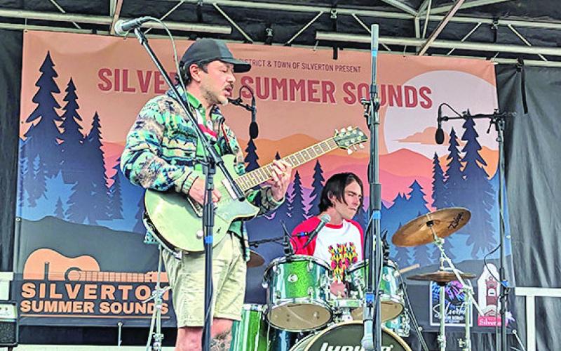 Local musicians playing at Summer Sounds concert. Photo credit Cracked Compass Photography