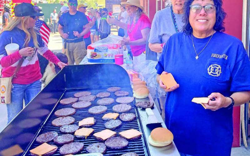 The Silverton Volunteer Fire Department feeding a long line of visitors and locals. Photo credit Janice Sanders