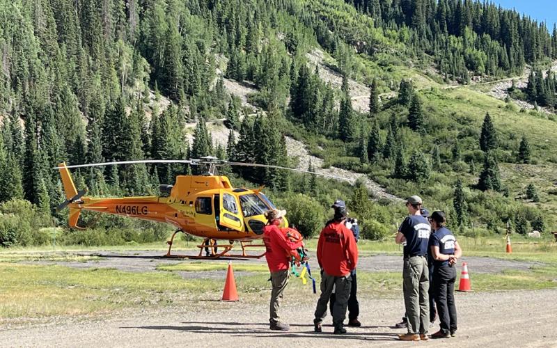 The Silverton Medical Rescue Team meets the Flight for Life helicopter and crew at the “LZ” (landing zone) in town after the OHV rollover to debrief the incident. Photo credit DeAnne Gallegos