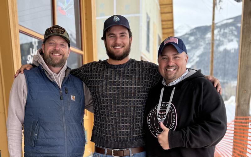 El Bandito owners Nick Fattor and Mario Letayf share a thank you to Silverton Skijoring President Jim Harper photo by DeAnne Gallegos