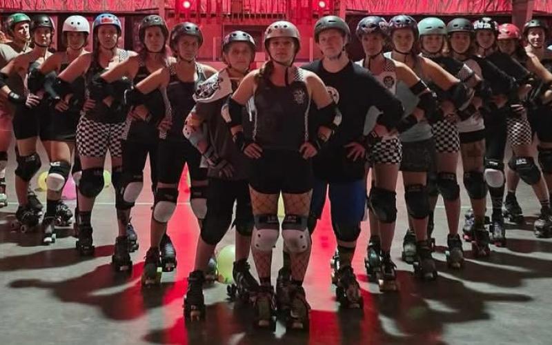 Emelie Dekay, who’s front and center of the Durango Roller Girls, posted up a new team photo taken at Chapman Hill in Durango. Photo by Emelie Dekay
