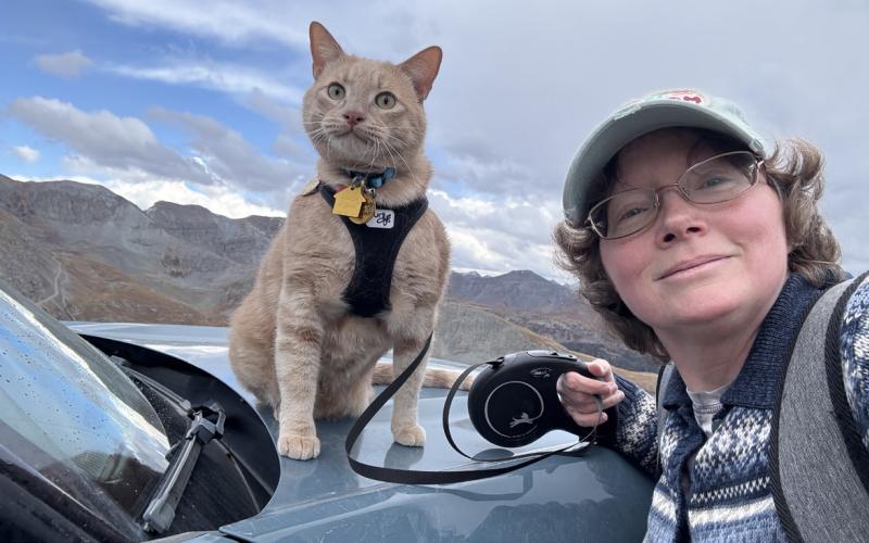 Tripod the three-legged cat and Melanie have been exploring the San Juan Mountains together this fall. Photo by Melanie Bergolc