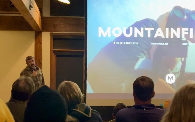 Rory Cowie emceeing the 2024 Mountainfilm on Tour in Silverton. Photo credit DeAnne Gallegos