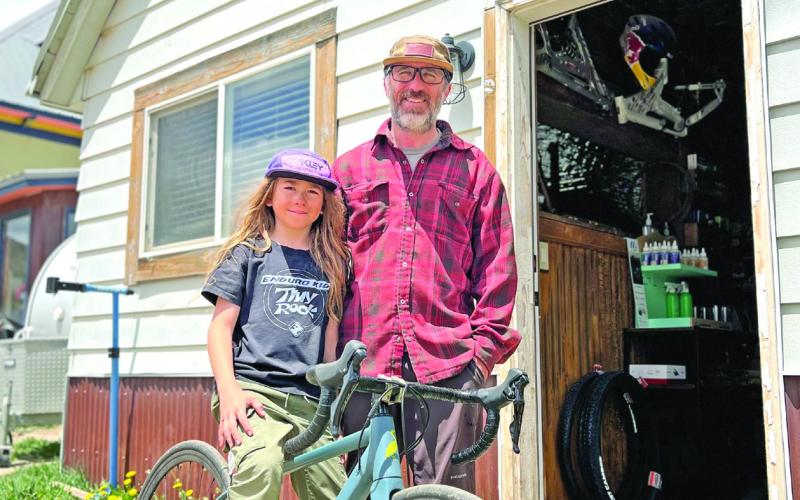 Griff and Cliff Pinto outside their bike shop. Photo credit DeAnne Gallegos