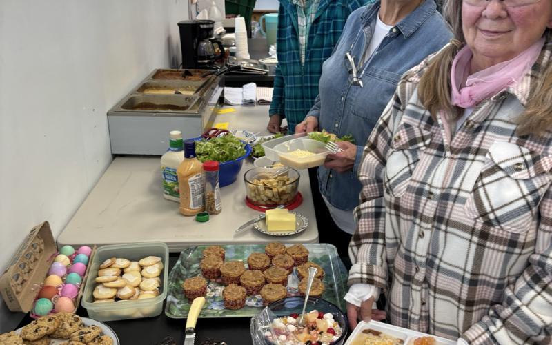 The winter’s senior weekly lunch program has wrapped up for the season. L-R Claudia Moe, Rose Raab, Betty Chavez, and Mary Lou Phillips photo by Becky Joyce