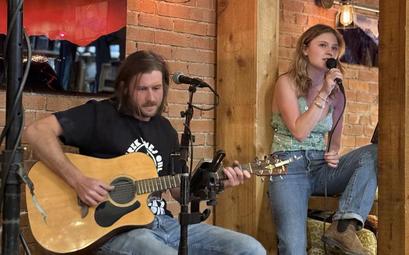 Musician PJ Moon featured a song with local vocalist Feline Brown at The Den last Tuesday night photo by DeAnne Gallegos