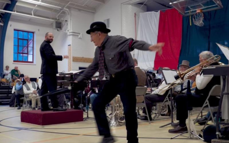 Longtime Silverton local Denny Kurtz dances for the large audience at the Brass Band concert. Photo credit David Dibble