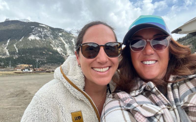 Beth Kremer and DeAnne Gallegos celebrate opening day of train on a cool May day. Photo credit DeAnne Gallegos