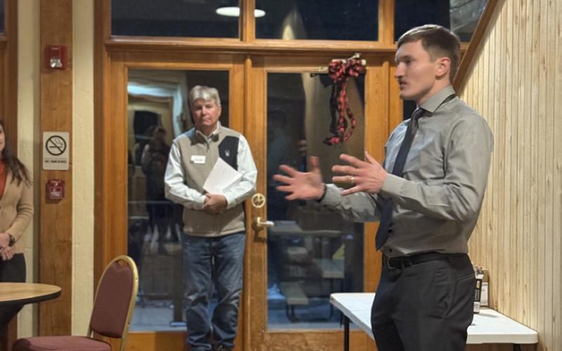 Candidate Chad Hall from Littleton gives quick elevator speech photo by DeAnne Gallegos
