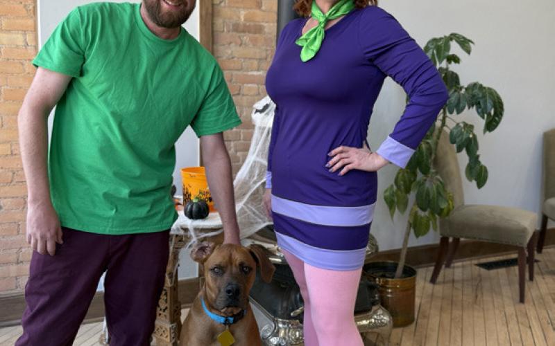 Citizens State Bank teller Pato Lira and Katrina Tennis dressed up as the Scooby Doo Bunch, Shaggy &amp; Daphanie and Pato even brought his dog in to be Scooby-Doo Photo by DeAnne Gallegos