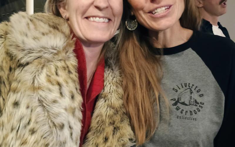 Photo by DeAnne Gallegos Anne Izard and Laurel Foster at the Dera Deli Winter party