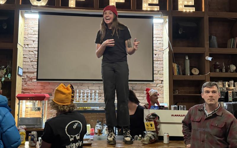 Photo by Allyn Robinson Holly Huebner, the owner of the Coffee Bear and partner in The Den, makes opening speech on opening night before the movie event
