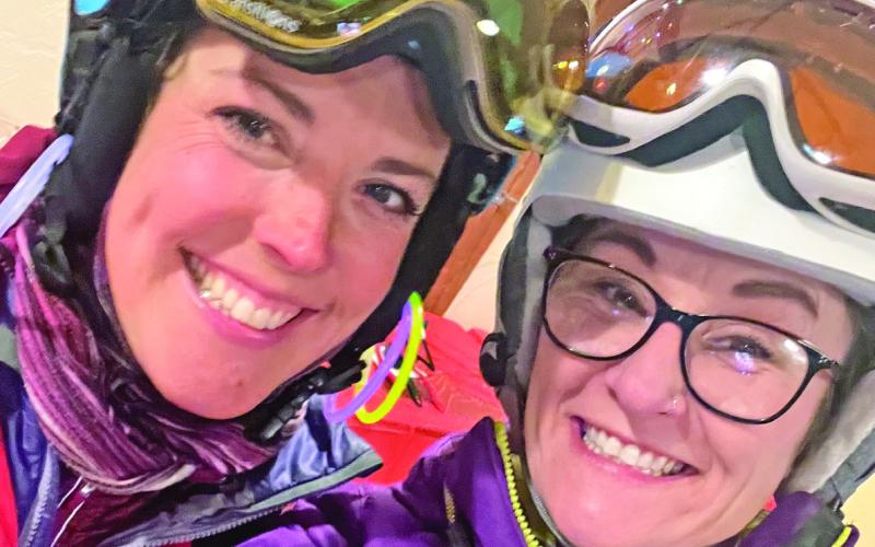 Silverton Strong’s Dayna Kranker and Misti Anderson getting ready for night skiing. Photo by Misti Anderson