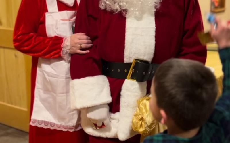 Mr. and Mrs. Claus at the Annual Holiday Community Potluck. Photo credit DeAnne Gallegos