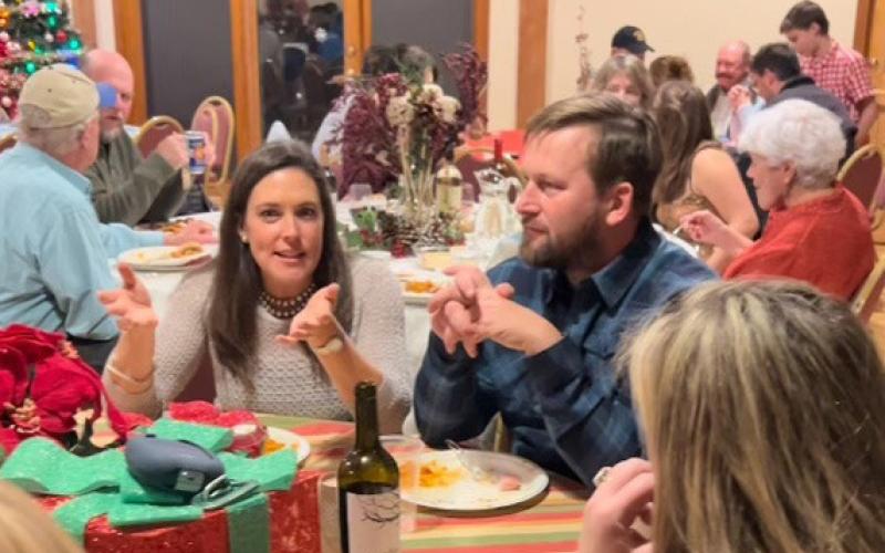 Another successful year! The Annual Holiday Community Potluck packed the Kendall community room and was full of smiling local face. Photo credit DeAnne Gallegos