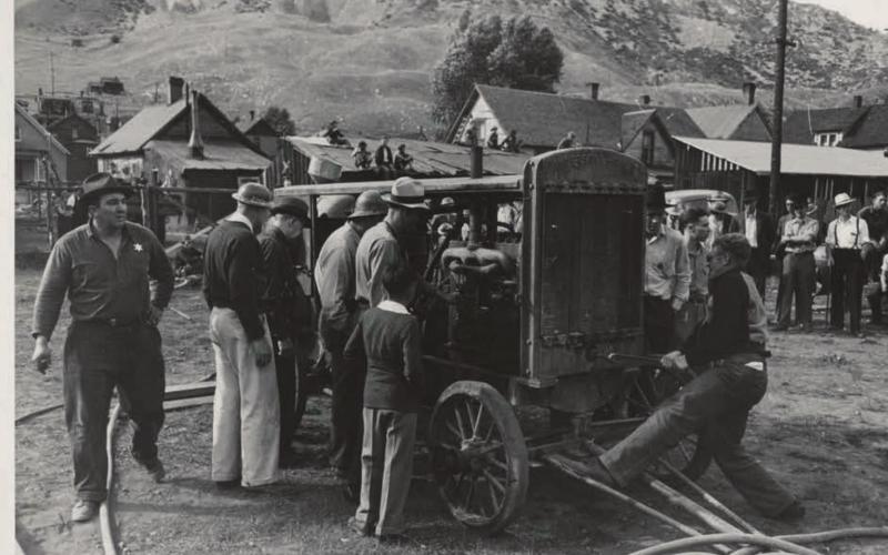 Cranking up motor which will supply power for the miners drilling contest approximately in 1940 in Silverton, Colorado. Photo credit: Creative Commons CC0 1.0 Universal Public Domain Dedication
