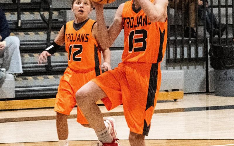 Taking the shot! The Silverton-Ouray Middle School boys basketball team. Photo credit David Emory
