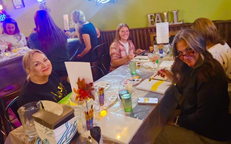 Lots of smiles at paint &amp; drink night last Friday, photo by Alpine Tavern.
