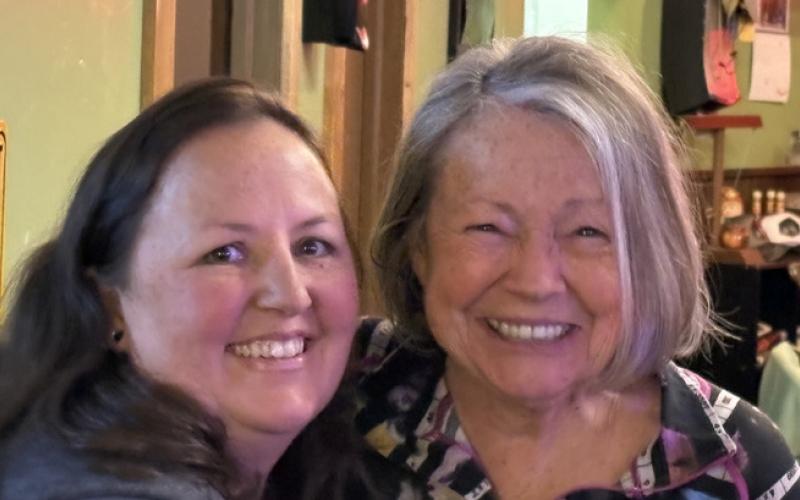 Photo by Lisa Risoli Lifelong local Deanna Jarmillo and local artist Kim Eisner are all smiles as Eisner was helping instruct the paint night at the Alpine Tavern.