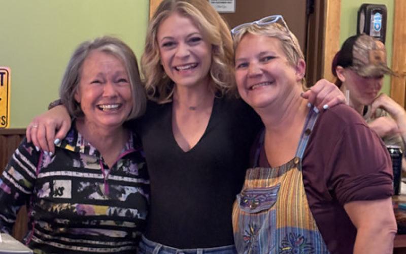 Photo by Lisa Risoli Kim Eisner, Alpine Tavern owner Shiloh Sams, and Keli Fries all celebrated a remarkably successful painting event.