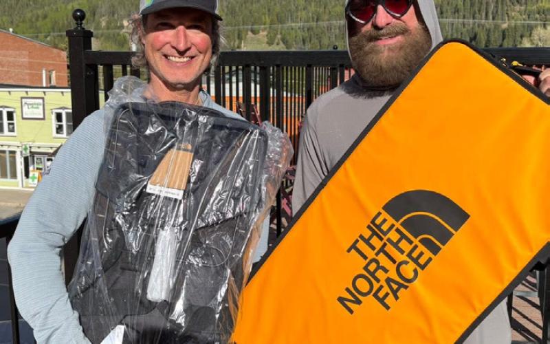 Hardrock Course Director Brett Sublett &amp; local Jimmy Keene with their raffle items photo by Dale Garland