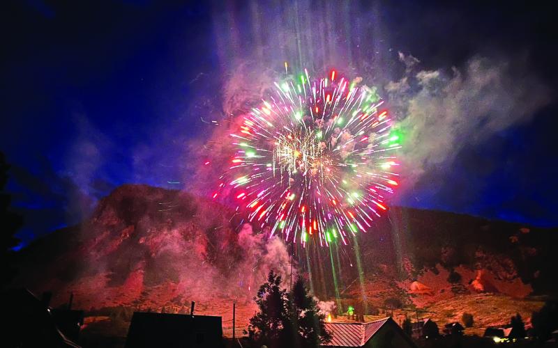 The fireworks burning bright above town Photo by Jamilynn Kaiser (Smith)