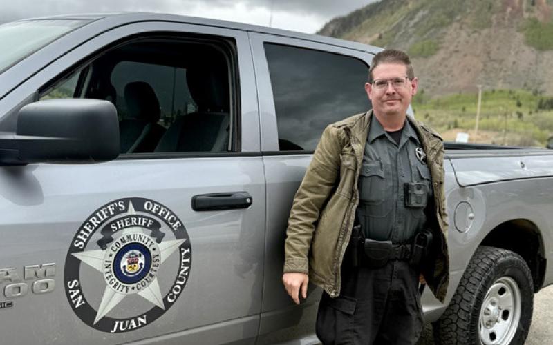 San Juan County Sheriff Steve Lowrance shows the new sheriff emblems on their trucks photo by DeAnne Gallegos