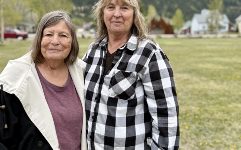 Sisters Sue Sanders and Charla Andreatta in Memorial Park for the veteran’s event photo by DeAnne Gallegos