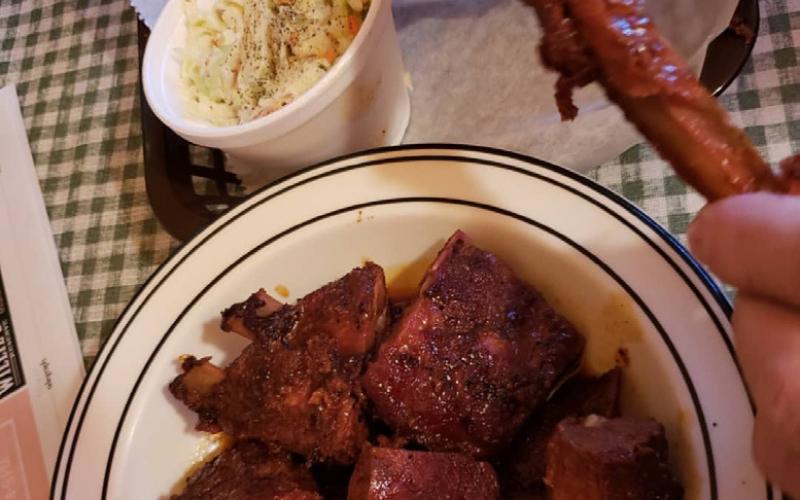 Chef Sherrie’s bread pudding with hazelnut sauce photo by T’s Smokehouse. Rib Tip Platter photo by T’s Smokehouse.