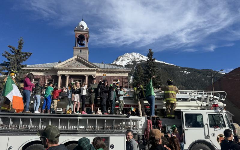 Silverton Volunteer Fire team put the school kids up on the fire truck for the St Patrick's Day parade photo by DeAnne Gallegos