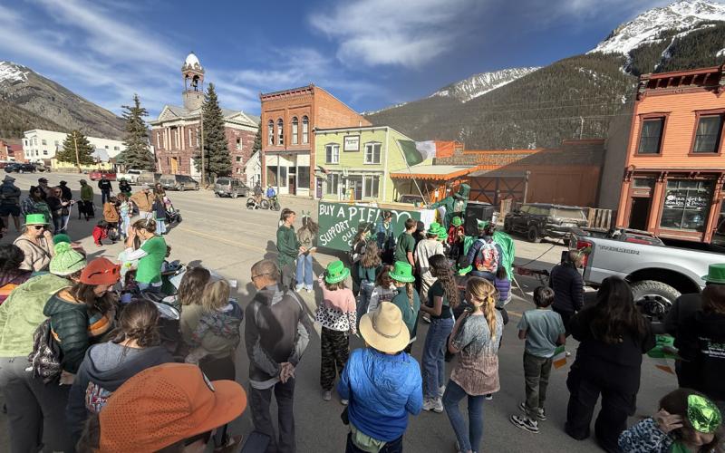 Large local crowd gathered on Greene St for parade photo by DeAnne Gallegos