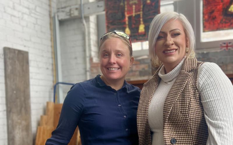 Silverton Powerhouse resident potter Jessie Rowe and resident artist Abigail Armistead, who is a canvas painter, sell wine, beer, mugs, and memberships during the open house. Photo credit DeAnne Gallegos