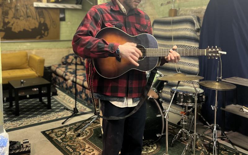 Julian Hood playing in the music room located in the Silverton Powerhouse where the local El Bandito house band practices twice a week. Photo credit DeAnne Gallegos