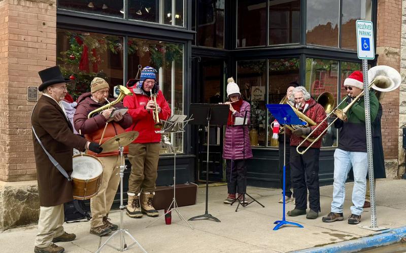 photo by Katie Fetch The Silverton Brass Band plays for the crowd at the corner of 13th &amp; Greene St on Christmas Eve
