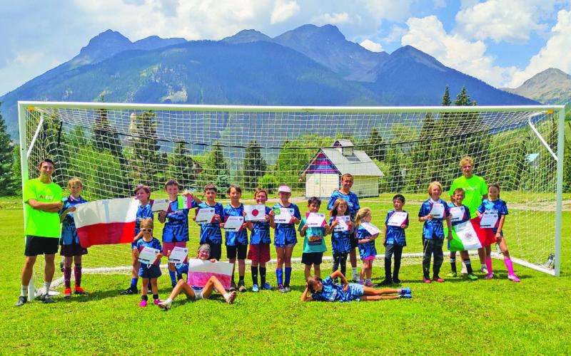 Silverton kids with the international soccer coaches from Poland. Photo credit Dayna Kranker