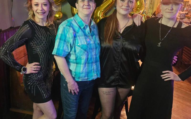 The Alpine Tavern team takes a group photo on New Year’s Eve Left to right: Shiloh Sams, Kelli Fries, Natalie Streeter, and Brittany Yamagiwa photo by Alpine Tavern