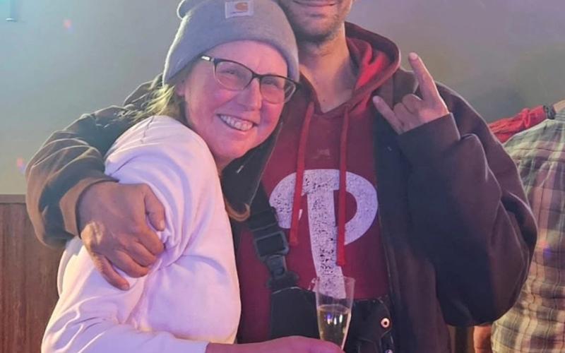 Silverton locals Wendy Polly and Mitchell Gillon cheers to the New Year photo by Alpine Tavern