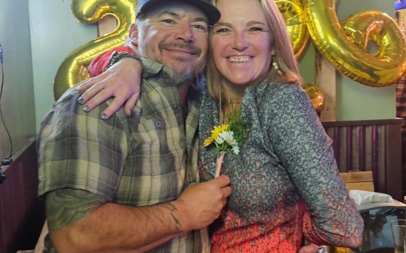 JP Stanley and Kim Maisch celebrate New Year's photo by Alpine Tavern