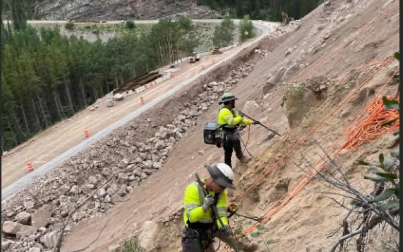 Crews working on rock wall. Photo by CDOT