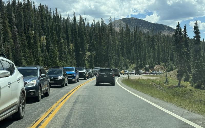 Line of cars headed northbound on Coal Bank Pass waiting for single lane traffic. Photo by DeAnne Gallegos