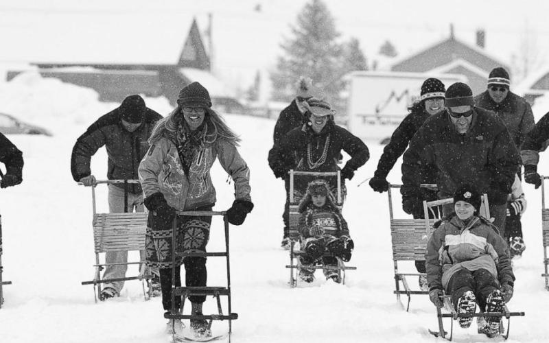 Kicksledders kick their way up Blair Street in the Kicksled Rodeo sponsored by the Colorado Mountain Club in 2011. Photo by David Emory for the Silverton Standard &amp; the Miner
