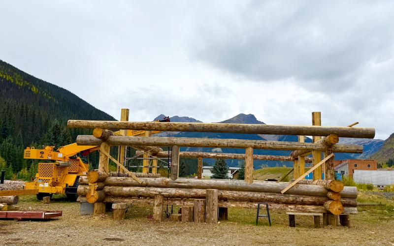San Juan Strcutures custom crafted log home is currently being built. photo by DeAnne Gallegos