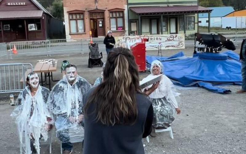 Town staff throw pie at trustees.
