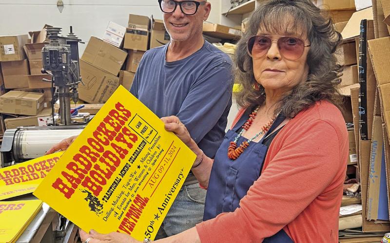 Tom Lanis and Judy Kuhlman show off the freshly printed 50th anniversary poster Photo credit DeAnne Gallegos