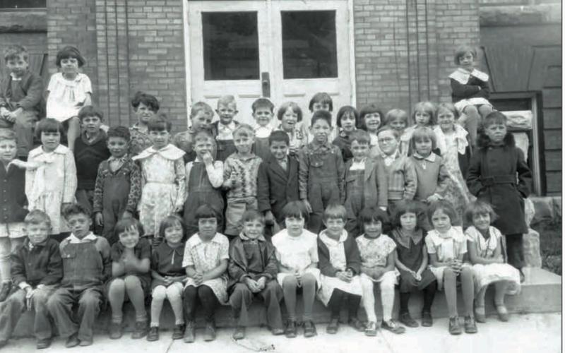 Young Silverton School students at the Snowden Street entrance to the school, probably in 1928. Photo courtesy of San Juan County Historical Society SILVERTON STUDENTS, 1928